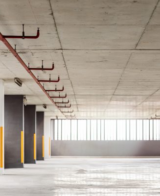 Empty parking lot in the daytime. Urban, industrial concept. Horizontal shot